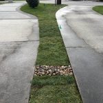 Drainage Solutions from Coastal Roots Landscape & Design